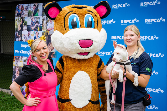 Pevan & Sarah with RSPCA QLD team member and Squint the dog